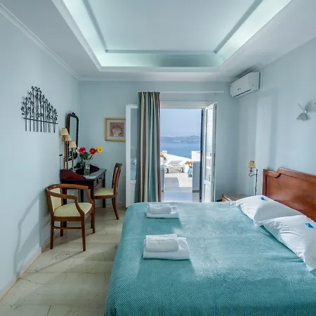 Отель Renos Тира